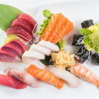 Sushi Sashimi Combo · Raw. 5 pieces sushi, 12 pieces sashimi with tuna roll