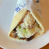 Pita Burger · Burger in a pita pocket with lettuce, onion, and Russian dressing. Served with our hand-cut ...