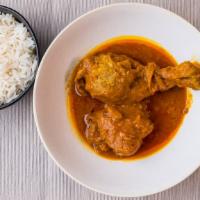 Curry Chicken · Fresh chicken cooked with gravy, onion, spice, and herb.