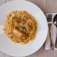 Chicken Biryani · Halal. Tender chicken cooked with basmati rice, onion, spice, and herbs.