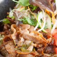 Dip Ramen Salad · Grilled pork with 2 types of special sauce, assorted green leaves, tomato, shredded daikon r...
