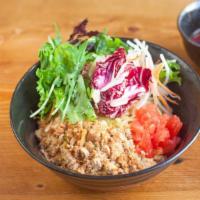 Dip Tofu Ramen Salad · Stir fried ground tofu with 2 types of special sauce, assorted green leaves, tomato, shredde...