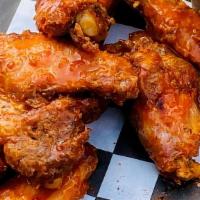 Buffalo Chicken Wings · Perfectly cooked chicken wings slathered in a spicy buffalo sauce.