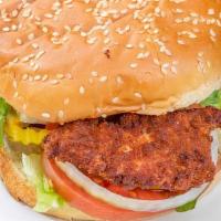 Crispy Chicken Sandwich · Crispy cornflake chicken with lettuce, tomato, onion, and pickles on a classic bun.
