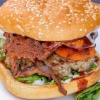 4 Spice Burger · An all-beef hamburger patty topped with BBQ Pulled Beef, lettuce, tomato, sauteed onions, pi...
