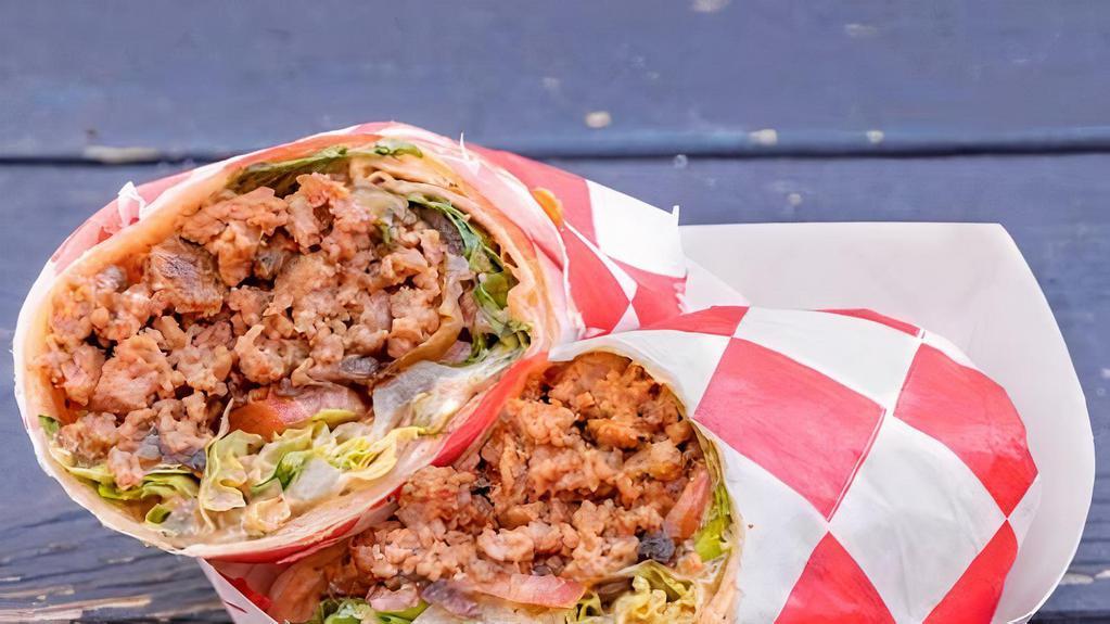Burger Wrap · Ground Beef with lettuce, tomato, sauteed Onion, & sauce in a classic wrap.