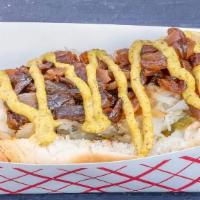 Killer Dog · An All-beef hot dog topped with sauerkraut, relish, sauteed onions, and deli mustard.