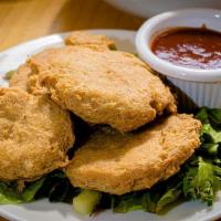 Vegan Nuggets · Crispy pan-fried soy Nuggets. Served with your choice of BBQ, Ranch dipping sauces! Gluten F...