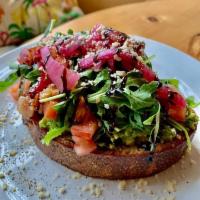 Chef'S Special Toast · Avocado, tomato, arugula, pickled onions, balsamic reduction. On toasted french sourdough br...