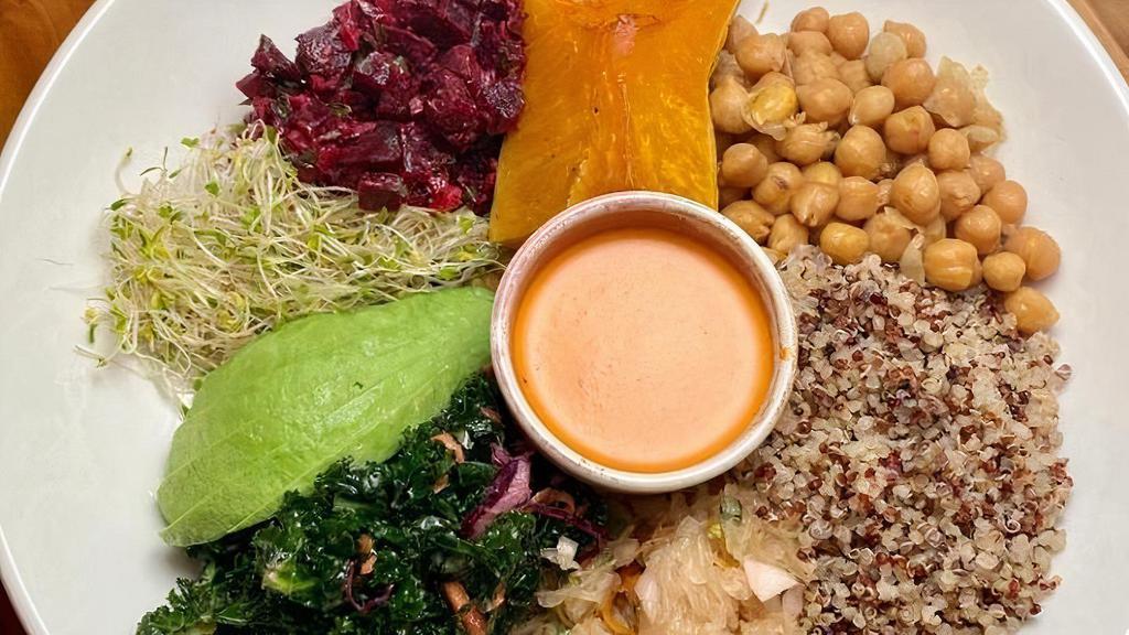 Macro Bowl · Cultivate peace and balance with this generous serving of healthy food! Quinoa, chickpeas, roasted honeynut squash, beet salad, kale salad, sauerkraut salad, avocado, with a side of Jungle dressing. Gluten Free