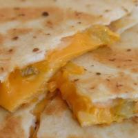 Kid'S Quesadilla · Grilled Flour Tortilla, filled with Violife cheddar cheese, served with pico de gallo salsa ...