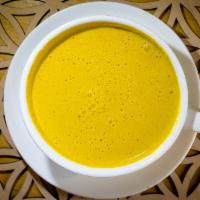 Hot Golden Mylk · Delicious ayurvedic healing beverage, almond mylk, turmeric, ginger, cinnamon, black pepper,...