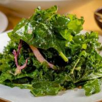 Kale Salad Side · Jungle Cafe's Famous Kale Salad with kale, dijon mustard, lime juice, cumin, sunflower oil, ...