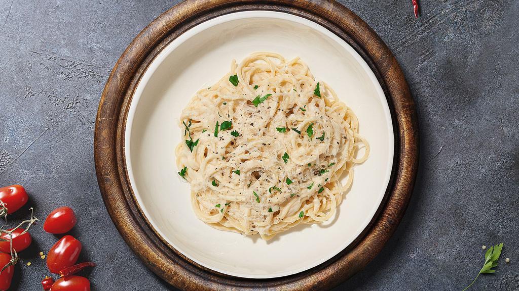 Don'T Be Alfredo · Linguini pasta cooked al dente tosses in creamy white sauce topped with grilled chicken and aged parmesan.