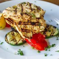 Pollo Marinato · Herb marinated organic chicken thighs, house-made olive oil & herbs, served with tomatoes & ...