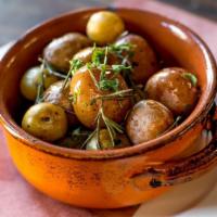Patate · Rosemary & thyme roasted potatoes.