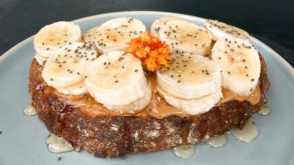 Nut Butter Toast · Balthazar’s Sourdough or Multigrain topped with your choice of almond or peanut butter with sliced bananas and drizzled honey from local hives