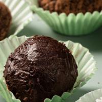 Chocolate Truffles · Vegan chocolate truffles available in sea salt, raw cacao and coconut