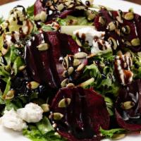 Beet Salad With Goat Cheese · Organic Beets, Spring mix, Goat Cheese & pumpkin seeds with balsamic glaze.
