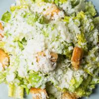 Caeser Salad · Parmesan cheese and crunchy croutons over a bed of crunchy Romaine lettuce dressed in a crea...