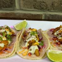 3 Fish Tacos  · Grilled fish, citrus slaw, cilantro, cheese, cherry pepper aioli & cilantro sour cream