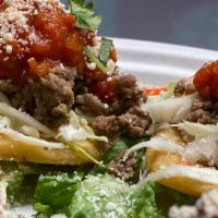Garnachas (Order Of 4) · Handmade corn tortillas topped with ground beef, onions, cilantro, queso fresco and Marinara...