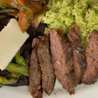 Churrasco · Grilled skirt steak served with spicy  jalapeño rice, refried beans, scallions and pico de g...