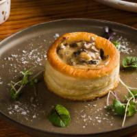 Feuilleté Aux Morilles & Cepes · Morel and porcini mushrooms cream puff pastry. Vegetarian.