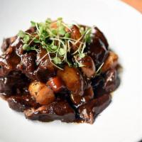 Daube Provençale · Braised Black Angus beef stew in a red wine sauce, black olives.