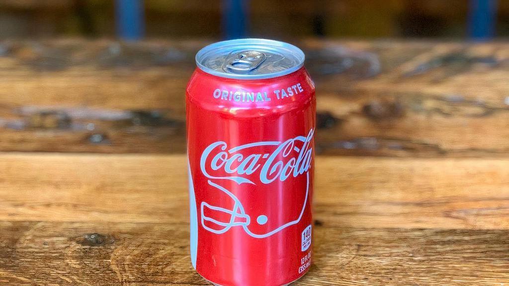 Coke · 12oz can (33cl).