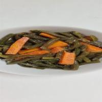 Fasolia · String beans and carrots cooked in a mild sauce.