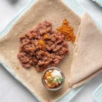 Kitfo · Spicy. Ethiopian steak tartare seasoned with mitmita and nitir kibe.