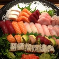 Love Boat For 2 · 10 piece of sushi, fifteen piece of sashimi and chef's special roll and spicy tuna roll. Ser...