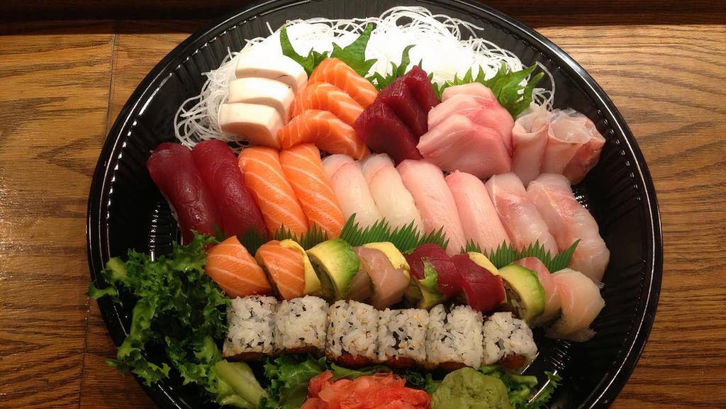 Love Boat For 2 · 10 piece of sushi, fifteen piece of sashimi and chef's special roll and spicy tuna roll. Served with soup or salad.