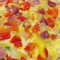 Western Omelette · 3 eggs, ham, peppers, and onions. Served with toast and butter.