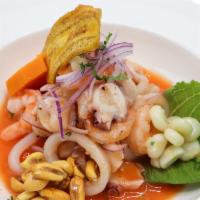 Ceviche Mixsto · Fresh corvina and seafoods marinated in Leche de Tigre. Served with sweet potato.