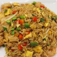Arroz Chaufa · Peruvian style Chinese fried rice mixed with egg, onions, ginger, bean sprout, and choice of...