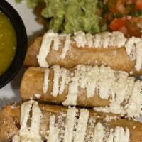 Flautas · Crispy rolled corn tortillas filled with cheese and choice of protein. Drizzled with sour cr...