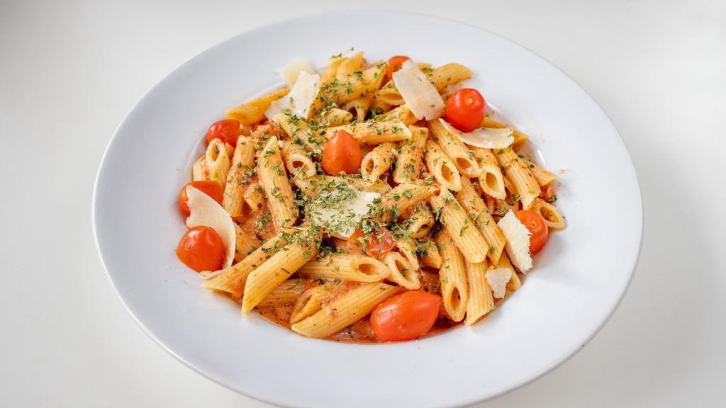 Creamy Vodka Sauce Pasta · With salmon, shrimp, or chicken in vodka sauce. Farfalle pasta cooked with vodka, heavy cream, smoked salmon, and herbs.