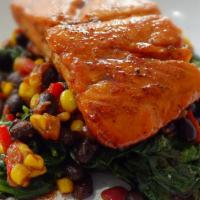 Honey Marinated Salmon With Black Bean Salsa · Salmon marinated in honey, lime, and a pinch of red pepper flakes then pan-fried and place o...