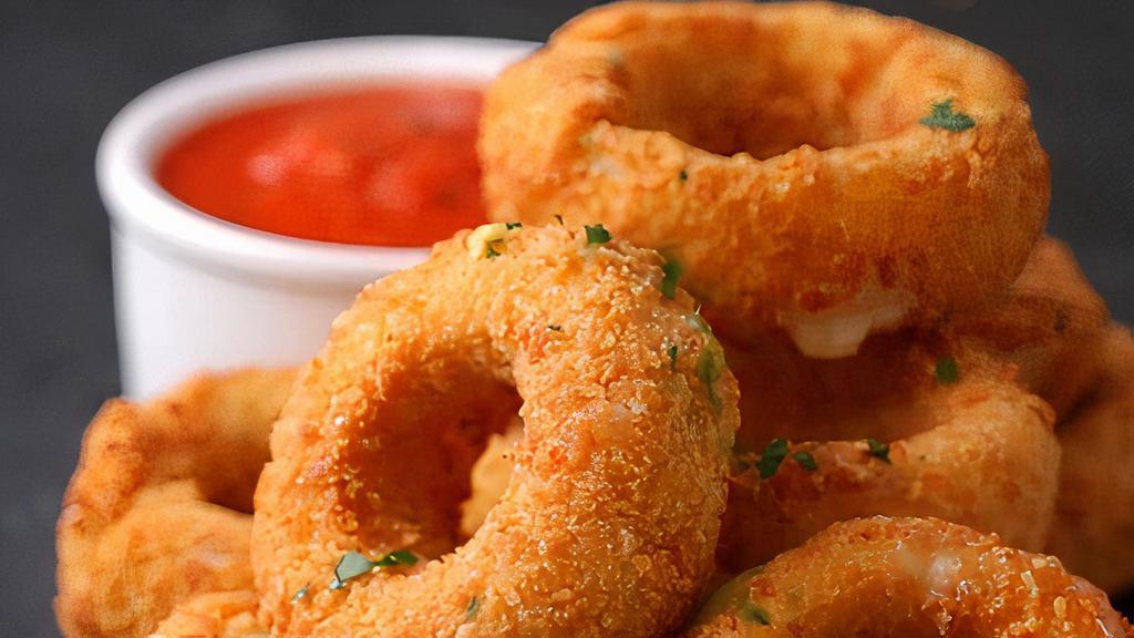 Onion Rings · An onion ring, also called a French fried onion ring, is a form of appetizer or side dish .American cuisine.