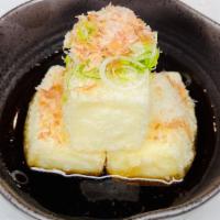💥Agedashi Tofu · Fried Tofu with grated dikon radish, scallion, and bonitoflakes.