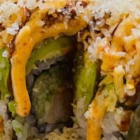 Manhattan Roll · Shrimp Tempura avocado, top with spicy Crab with crunch and eel sauce.