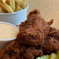 Combo 1 - Tenders W/Side · 3 Tenders with Fries.  Served with sliced bread, pickles, and a side of cool down sauce.