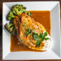 Mero · Pan-roasted filet of grouper served with red potato mash, charred broccoli, and Thai chili s...