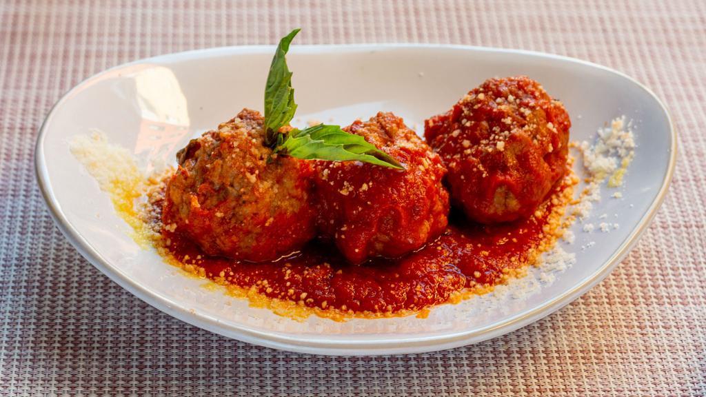 Polpette Al Sugo  · Beef meatballs with tomato sauce, basil, and parmesan cheese