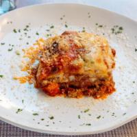 Lasagna Al Forno · Homemade lasagna made with bolognese ragu (beef) bechamel sauce, mozzarella, and parmesan ch...