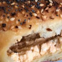 Everything Kolache · Stuffed with a southwestern cream cheese filling and topped with an everything bagel seasoni...