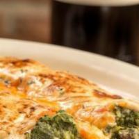 Canelones De Espinaca · Spinach cannelloni with a mixture of tomato and white sauce.