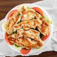 Marinated Chicken On A Garden Salad · Chicken breast marinated and grilled in a lemon garlic mix on top garden salad (Marinated ch...